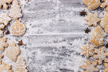 Christmas and New Year celebration traditions. Texture with homemade gingerbread cookies and spices...