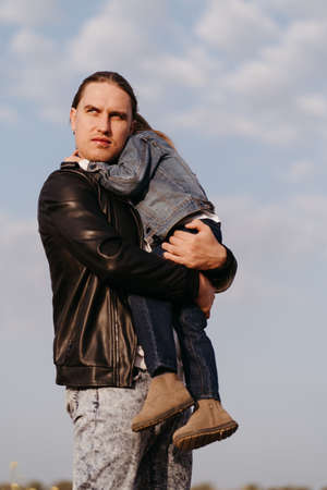 Dad and daughter. Fatherhood, family concept, warm hugs. Loving father spending time with his little daughterの写真素材