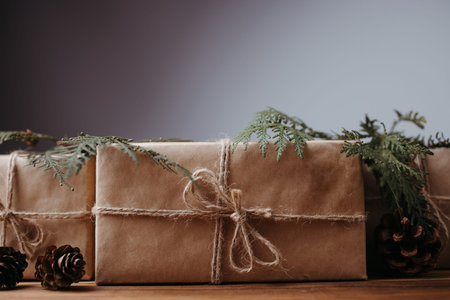 Christmas holiday concept, eco decor. Zero waste and eco-friendly embellishments. Gift boxes wrapped...