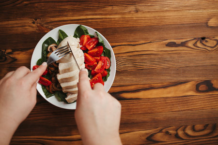 Diet concept, healthy lifestyle, low calorie food, low carb diet. Fat woman eating baked chicken...