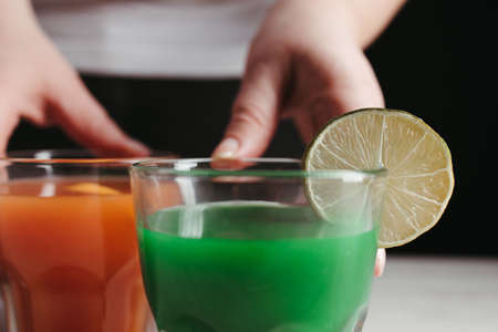 Overweight woman with detox smoothie. Clean eating, weight loss, healthy dieting foodの写真素材