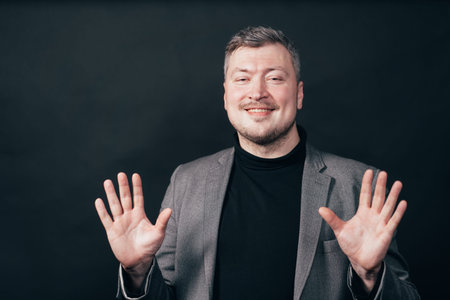 Business man showing no problem gesture