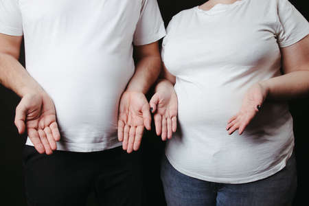 Overweight family, dieting and couple weight lossの写真素材