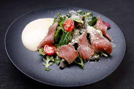 Restaurant menu, roast beef and vegetable saladの写真素材