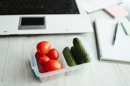 Healthy snack at office, lunch box with vegetables