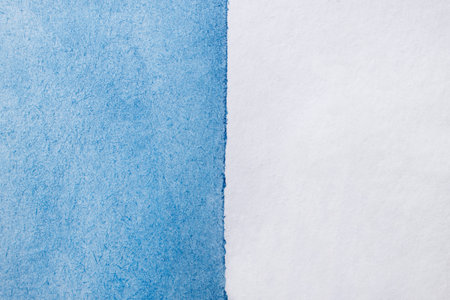 An abstract hand drawn blue watercolor background