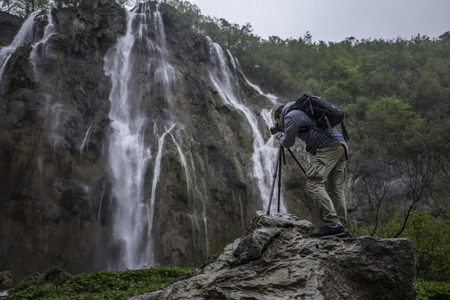 Photographer is making picture of wonderful waterfalls in Plitviceの写真素材