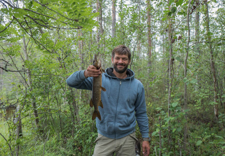 Man caught a pike fishの写真素材