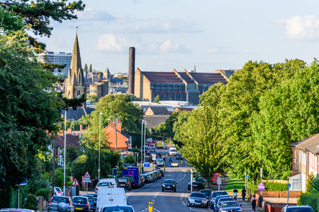 Northampton UK - Aug 15 2017: Cloudy Day Cityscape View of Northampton UK with road in foregroundのeditorial素材