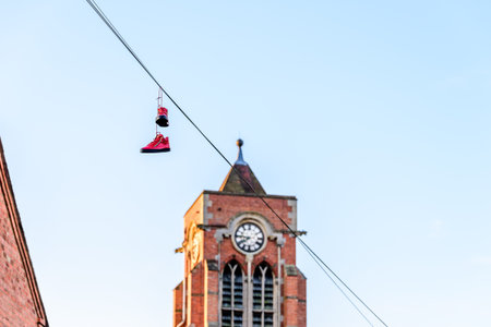 Pair of boots hanging on power lines in English Town