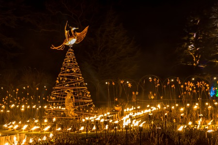 Fire walk and candle for christmas decoration outdoorの写真素材