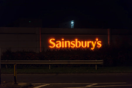 Northampton UK October 3, 2017: Sainsburys logo sign in Northampton town centre.のeditorial素材