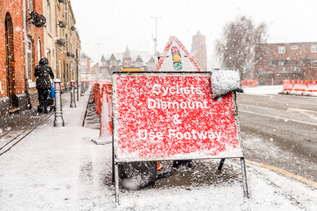 Snow covers England streetsの写真素材