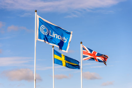 Northampton, UK - Oct 25, 2017: Day view of Lindab logo on flag at Riverside Retail Parkのeditorial素材