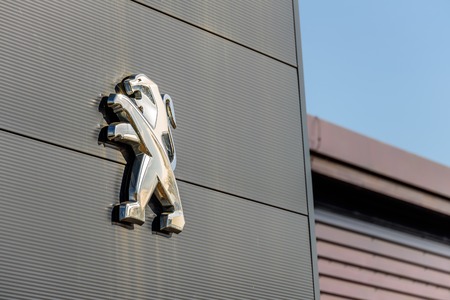 Northampton, UK - Oct 25, 2017: Day view of Peugeot logo at Riverside Retail Parkのeditorial素材