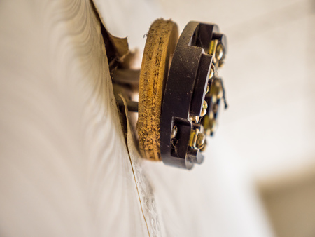 Closeup view broken electrical outlet socket on wallの写真素材