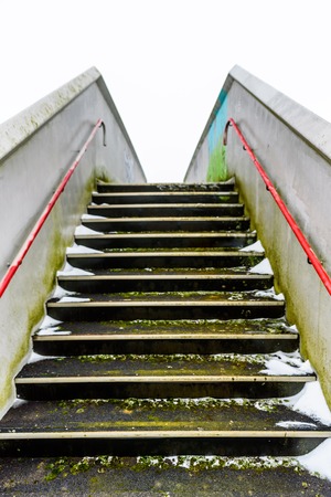 Empty Pedestrian Metal Bridge Elevated Walkway Over British Railroadの写真素材