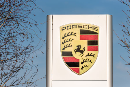 Northampton UK February 24 2018: Porsche logo sign stand in Northampton Town Centreのeditorial素材