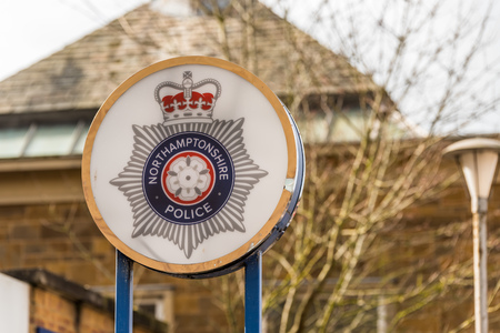Daventry UK March 13 2018: Northamptonshire Police logo sign stand in Daventry town centreのeditorial素材