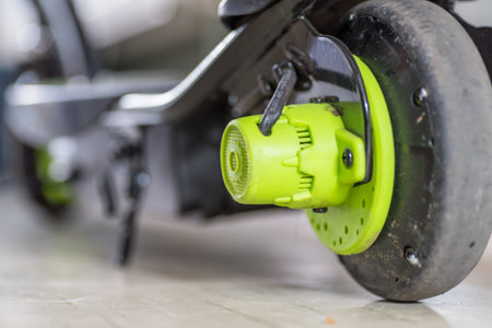 Closeup day view electric scooter charging upの写真素材