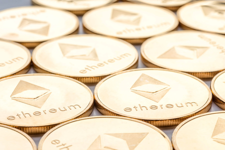 Overhead view Ethereum cryptocurrency coins laid flatの写真素材