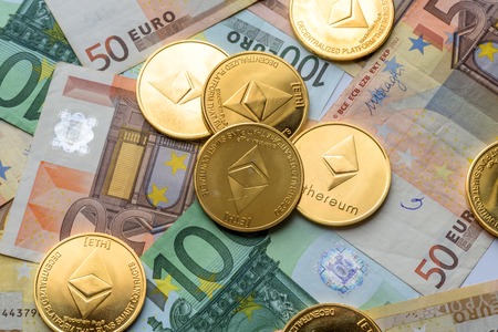 Ethereum coins on Euro notes, future concept financial currency, crypto currency signの写真素材