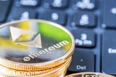 Ethereum coin symbol on laptop, future concept financial currency, crypto currency signの写真素材