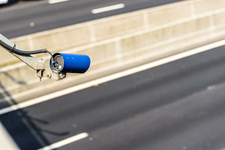 Speed camera monitoring traffic on UK Motorwayの写真素材