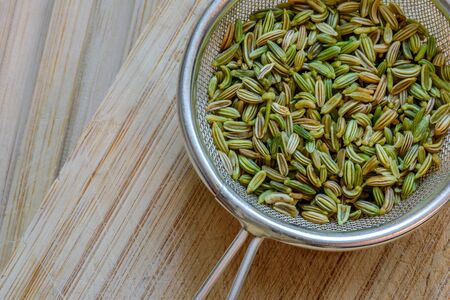 fennel seeds inside sieve brewing for healthy drinkの写真素材