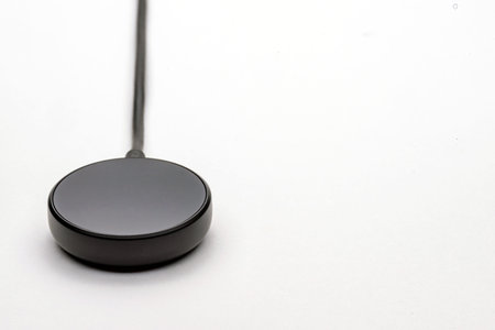 smart watch wireless charging pad on white background