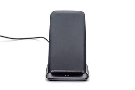 cellphone wireless charging stand pad on white background.