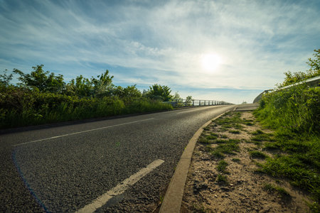 empty uk motorway road countryside junction in england.