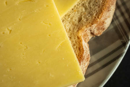 cheddar cheese sandwich on plate closeupの写真素材