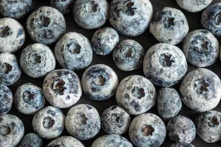 frozen ripe blueberries closeup background