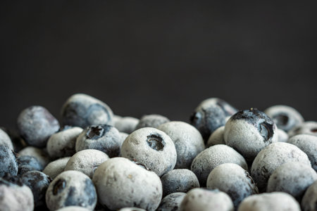 frozen ripe blueberries closeup background