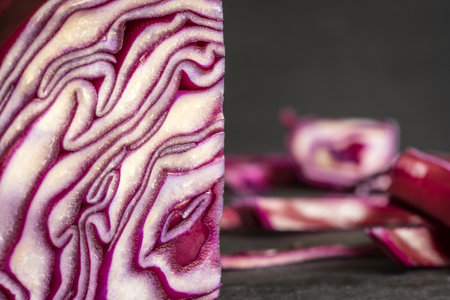 cut open purple cabbage closeup backgroundの写真素材