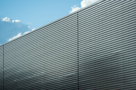 Warehouse wall metal texture surface in industrial estate in england, uk