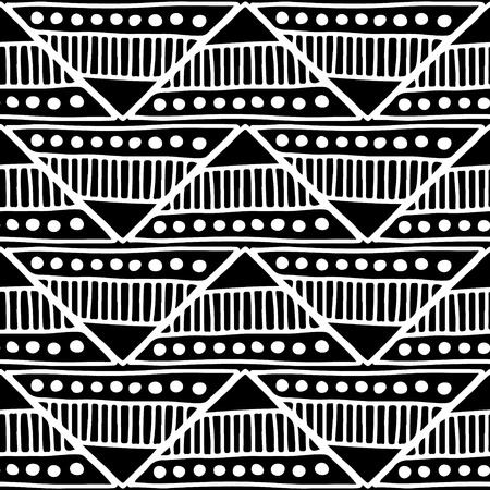 Seamless vector pattern. Black and white geometrical background with hand drawn decorative tribal elements. Print with ethnic, folk, traditional motifs. Graphic vector illustration.のイラスト素材