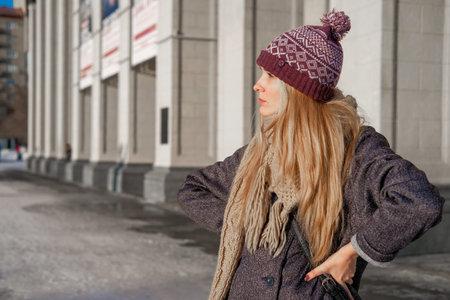 Portrait of a woman in autumn clothes. Winter and autumn trend.