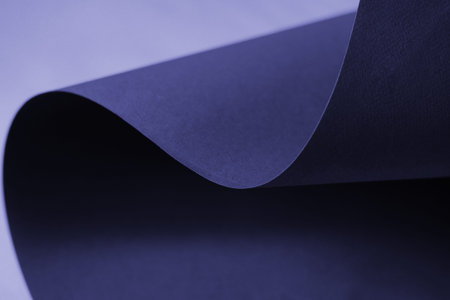Abstraction of a design purple wallpaper . Minimalist violet empty space on monochrome paper.