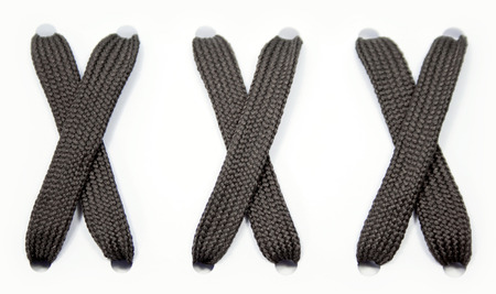 dark lace with a bow on a white backgroundの写真素材