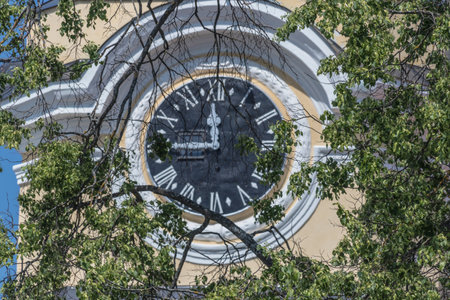 Clock on the facade of the Cathedral of St. Nicholas in Vilnius, Lithuaniaの写真素材