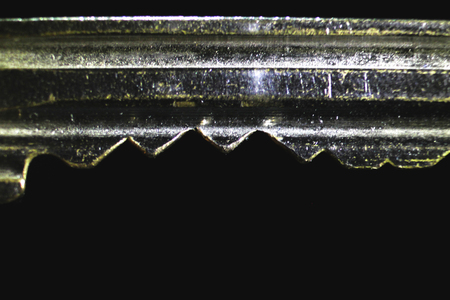magnified key image on the black background. Selective focusの写真素材