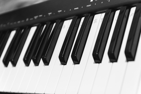 Black and white piano keys, side view. The concept of music.の写真素材