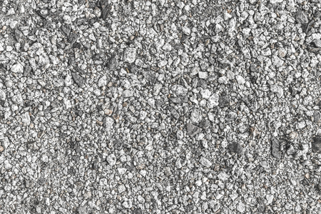 background texture. small gray pebbles on the ground.の写真素材
