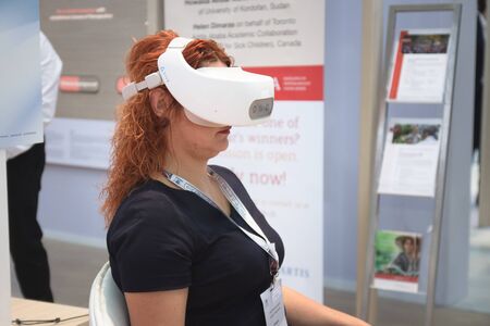 Vienna, Austria - September, 2018: woman in black in VR equipmenのeditorial素材
