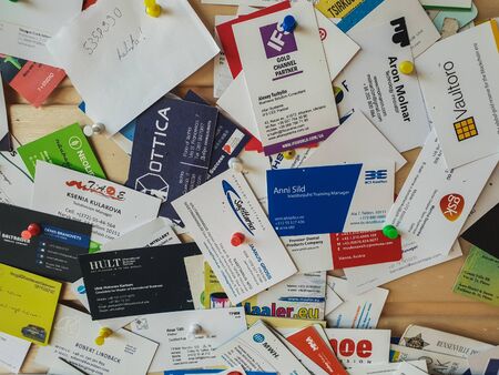 TALLINN, ESTONIA - MAY 2018 - A large number of business cards aのeditorial素材