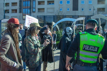 Vilnius, Lithuania - May 19 , 2018: police officer at the protest action of the legalization of...