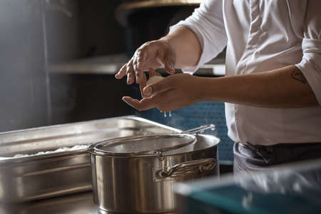 The process of creating fresh mozzarella cheeseの写真素材