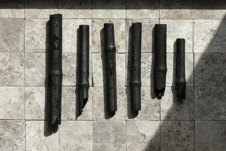 Bamboo charcoal sticks on stone tales top view